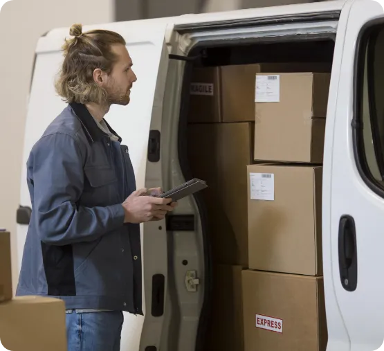 person organizing boxes